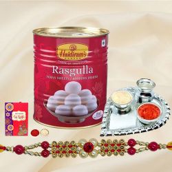 Appealing Thread Rakhi N Haldiram Rosogolla with Silver Plated Thali