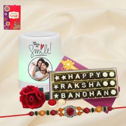 Delightful Stone Rakhi with Personalized Speaker N Handmade Chocolates