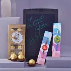 Superb Kids Rakhi with Rocher N Writing Pad Trio to Taran Taaran