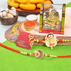 Mouthful Joy with Dual Ganesh Rakhis to Chittaurgarh