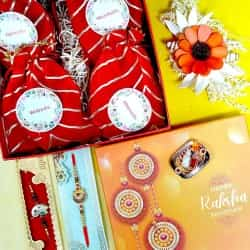 Charming Ganesh Rakhi  N  Nuts Combo