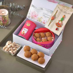 Charming Bhaiya Bhabhi Rakhi with Sweet N Nut Hamper