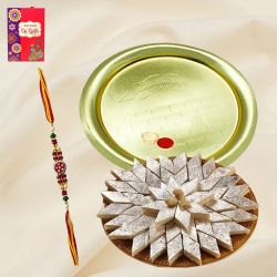 Haldiram Kaju Katli and Gold Plated Puja Thali along Rakhi, Roli Tilak and Chawal