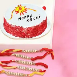 Enticing Rakhi Set of 4 with Red Velvet Cake