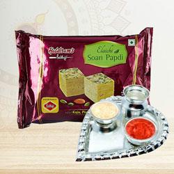 Delightful Gift of Paan Shape Puja Thali with Bikaji Soan Papdi to Rajamundri