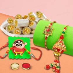 Mesmerizing Rakhi with Kaju Pista Roll Gift Set to Uk-rakhi-sweets.asp