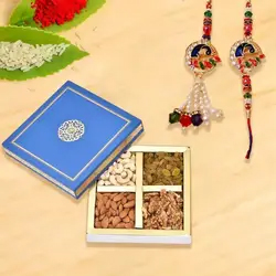 Astounding Bhaiya-Bhabi Rakhi Combo to Uk-rakhi-dry-fruits.asp