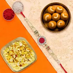 Rakhi With Mix Namkeen And Besan ladoo to Rakhi-to-uk.asp