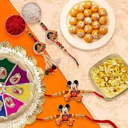 Ecstatic Combo of Boondi Ladoo, Mixture, Rakhi Thali, 1 Bhaiya Bhabhi Rakhi Set and 2 Kids Rakhi to Uk-rakhi-dry-fruits.asp