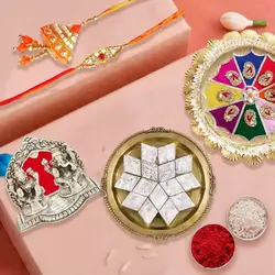 Bhaiya Bhabhi Rakhi Set with Kaju Katli, Pooja Thali n Ganesh Laxmi Mandap to Rakhi-to-uk.asp