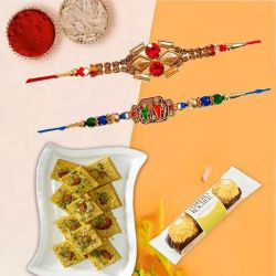 Twin Rakhi and Ferrero Rocher with Soan Papdi to Rakhi-to-uk.asp