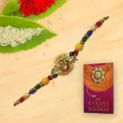 Alluring Stone-Dotted Om Rakhi to Rakhi-to-uk.asp