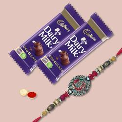 Ethnic Rakhi with 2 Chocolates, Roli Chawal Tika n Card to Stateusa.asp