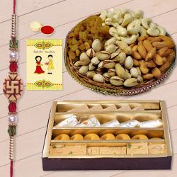 Pious Ganesh Rakhi with Assorted Sweets n Dry Fruits to Rakhi-to-usa.asp