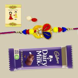 Gorgeous Zardozi Rakhi with Chocolate, Roli Tika N Card to Rakhi-to-usa.asp