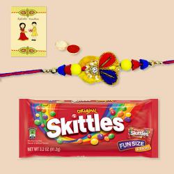 Classy Rakhi with Skittles Pack, Roli, Chawal N Card to Stateusa.asp