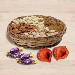 Lovely Gift of Exotic Dry Fruits, Chocolates n Diya Pair to Diwali-usa.asp