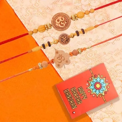 Graceful Three Om Rakhi Set with Roli Chawal Tika n Rakhi Card to Usa-only-rakhi.asp