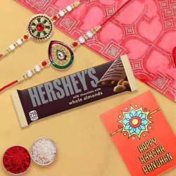 Exquisite Rakhi Pair with Hersheys Kisses Chocolates to Usa-serch-by-price.asp