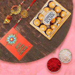 Classy Bhaiya Bhabhi Rakhi with 12pc Ferrero Rocher Pack to Rakhi-to-usa.asp