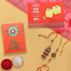 Graceful Bhaiya Bhabhi Rakhi with Haldiram Soan Papadi n Card to Usa-rakhi-sweets.asp