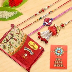 Appealing Family Set Rakhi with Haldiram Soan Papdi to Usa-rakhi-sweets.asp