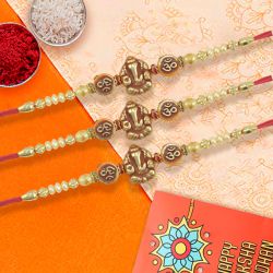 Sacred Ganesh Rakhi Trio to Rakhi-to-usa.asp