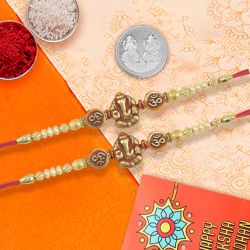 Ganesh Rakhi Pair With Silver Coin to Rakhi-to-usa.asp
