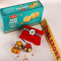 Yummy Treat of Soan Papdi and Toblerone with Rakhi to Usa-only-rakhi.asp