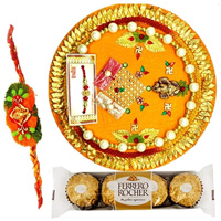 Relishing  Ferreo Rocher Chocolates and a special Pooja Thali with a Free Rakhi to Rakhi-to-world-wide.asp