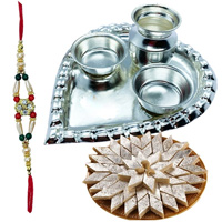 Kaju Katli from Haldiram and Silver Plated Paan Shaped Puja Aarti Thali with Rakhi to Rakhi-to-world-wide.asp