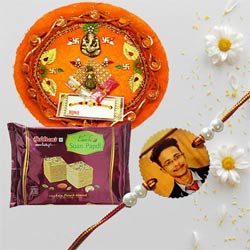 Photo Rakhi with Haldirams Papdi N Pooja Thali to Rakhi-to-world-wide.asp