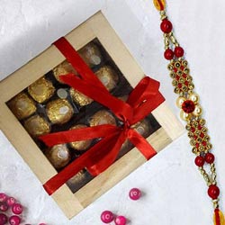 Exclusive Ferrero Rocher in Wooden Box with Rakhi to World-wide-rakhi-chocolates.asp