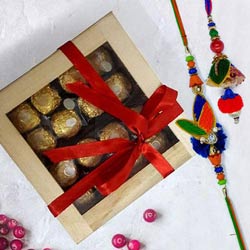 Delicious Ferrero Rocher in Wooden Box with Rakhi to World-wide-rakhi-chocolates.asp