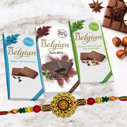 Auspicious Om Rakhi with Belgian Chocolates Trio to Rakhi-to-world-wide.asp