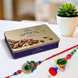 Cadbury Rich Dry Fruits Tin with Bhaiya Bhabhi Rakhi to Rakhi-to-world-wide.asp