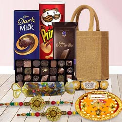 Rakhi Gift Bag of Pooja Thali and 2 pcs Om Rakhi to Rakhi-to-world-wide.asp