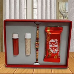 Stone Studded Rakhi with KitKat Chocolate Bar to Rakhi-to-world-wide.asp