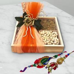 Exquisite Bhaiya Bhabhi Rakhi Set with Dry Fruits to Rakhi-to-world-wide.asp