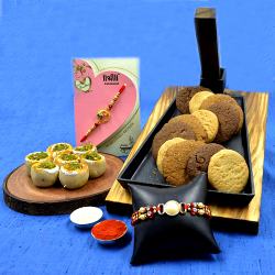 Assorted Cookie Man Cookies n Haldiram Kaju Pista Sweets with 2 Rakhi to Rakhi-to-world-wide.asp