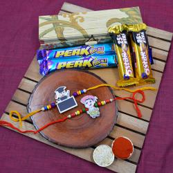 Special Twin Kids Rakhi N Cadbury Assortments in Bamboo Box to Rakhi-to-world-wide.asp