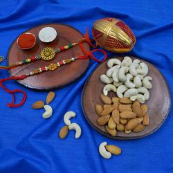 Ethnic Rakhi Pair with Dry Fruits Assortments to Rakhi-to-world-wide.asp