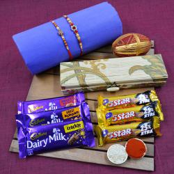 Dazzling Stone Rakhi Set N Cadbury Assortments in Bamboo Box to Rakhi-to-world-wide.asp