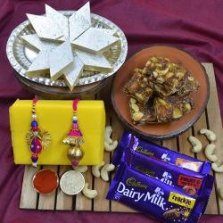 Designer Bhaiya Bhabhi Rakhi with Puja Tray, Haldiram Sweets N Cadbury Chocolates to Rakhi-to-world-wide.asp