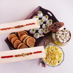 Designer Rakhi Pair with Sweets N Snacks to Rakhi-to-world-wide.asp