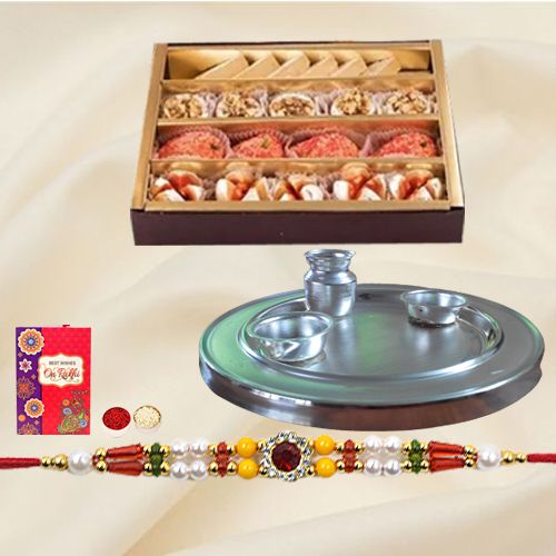 Premium Assorted Sweets and Stylish and Trendy looking Silver Plated Paan Shaped Puja Aarti Thali (weight 52 gms) along Rakhi, Roli Tilak and Chawal to World-wide-rakhi-thali.asp
