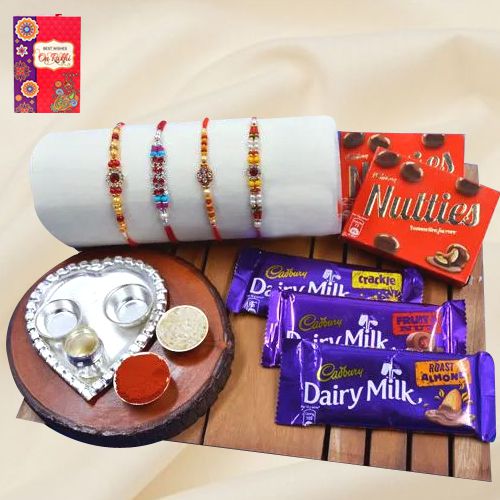 Charming Stone Rakhi Set with Paan Shape Thali n Assorted Chocolates to World-wide-rakhi-thali.asp