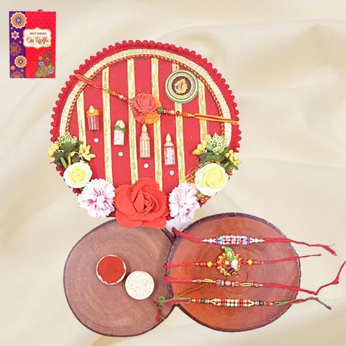 Stunning Stone Rakhi Set of 4 with Shree Rakhi Pooja Thali to Rakhi-to-world-wide.asp