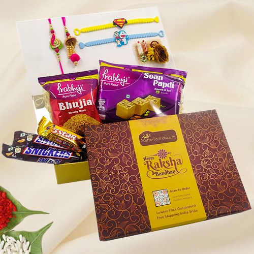 Raksha Bandhan Gift of Sweets, Chocolates and Family Rakhi Set of 4 pcs in a Gift Box to Rakhi-to-world-wide.asp
