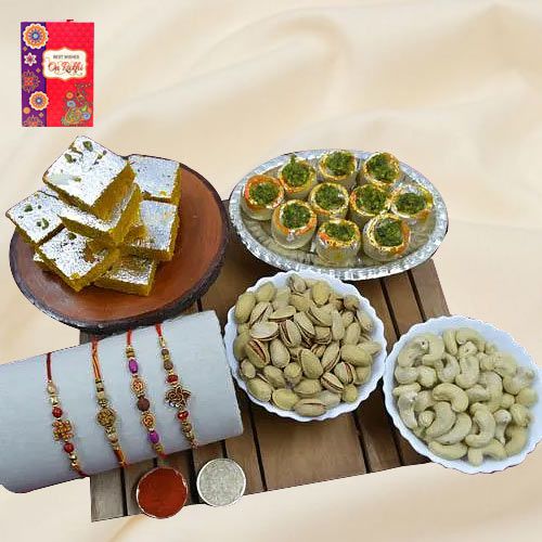 Remarkable Set of 4 Rakhis with Haldiram Sweets N Assorted Dry Fruits to World-wide-rakhi-sweets.asp